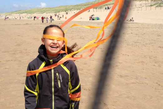 kinderfotografie - vliegeren op het strand